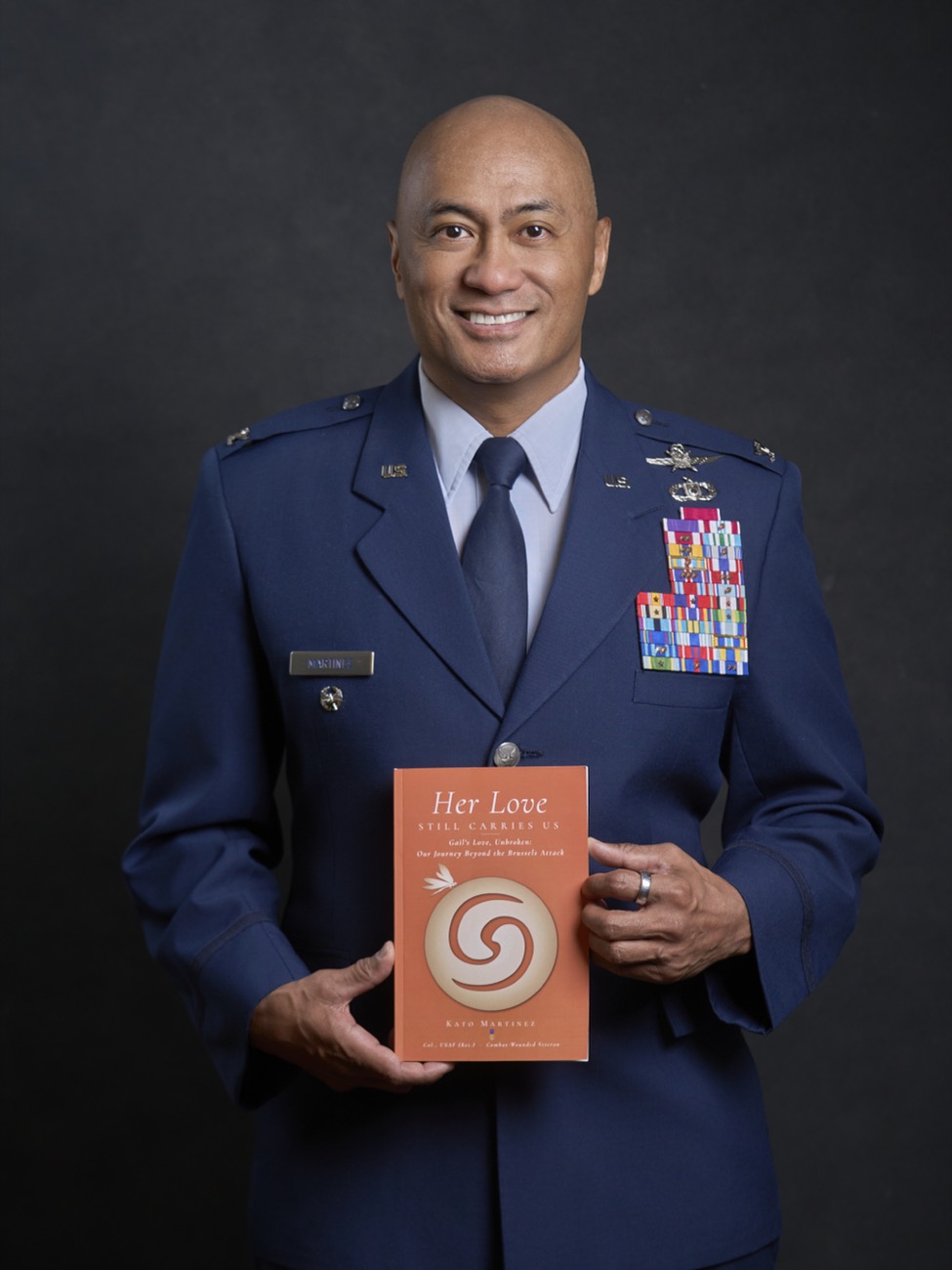 Kato Martinez, author of Her Love Still Carries Us